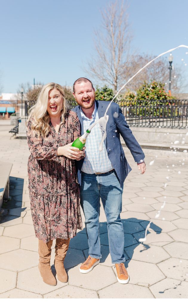 Engagement photos with champagne